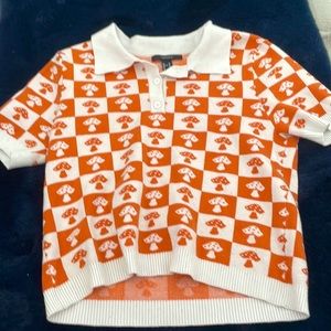 Checkerboard patterned mushroom button-up.